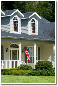 house with flag on porc